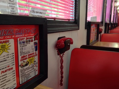 [And here I thought the Red Phone was reserved for Presidents and Batman, not for average Joes to order food from the booth.]