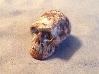 [Technically, I think this is a crystal skull, although it's a bit smaller and more opaque than the more well known examples.]