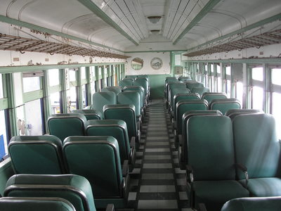[I found this passenger car very depressing—the seats are smaller than what you would find on an airplane!]