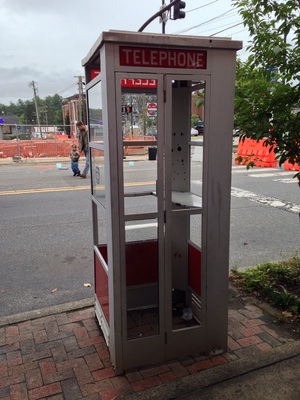 [Superman would totally use this last remaining phone booth but the trip here at super-speed would burn his “Clark Kent” clothes completely away on the trip from Metropolis.]