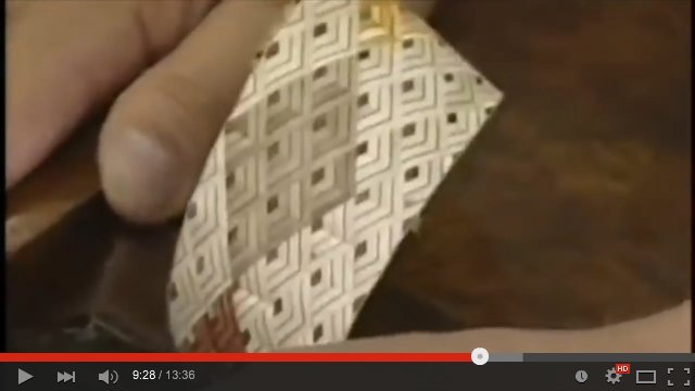 [This is really a wood shaving that's paper-thin.  And from what I've seen of other Japanese carpenter videos, this isn't even all that thin a piece!]