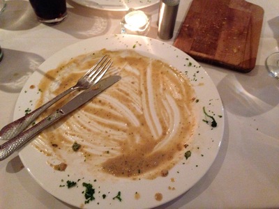 [A picture of a plate full of food is so cliché.  Why not mix it up a bit with a picture of a post dinner plate?  Who knows?  It could be the next fad!]