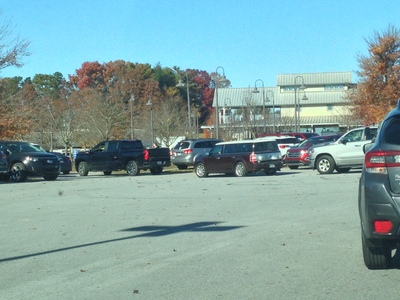 [a picture of a crowded parking lot] “Is there another way out?” “I don't know, parking lot designers are sadistic bastards.”