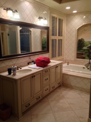 [A vanity with his and her sinks, beyond is the bathtub.] I really need a fisheye lens to get the scale of this place.